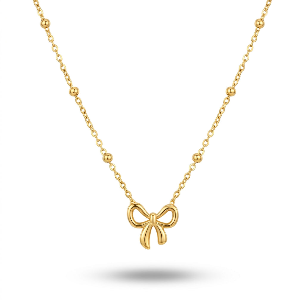 Elegant Golden Bow Pendant Necklace with Beaded Chain for Women