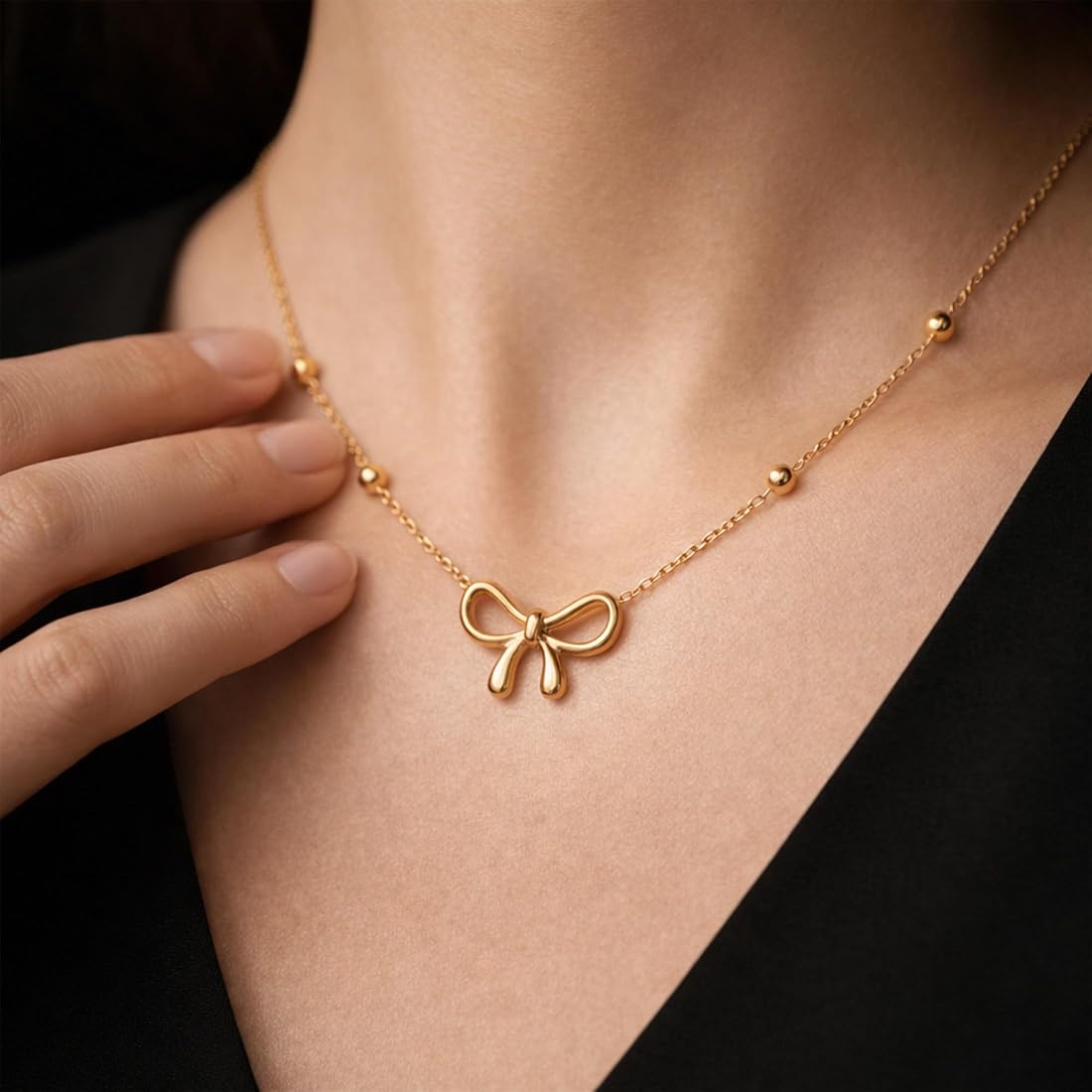 Elegant Golden Bow Pendant Necklace with Beaded Chain for Women